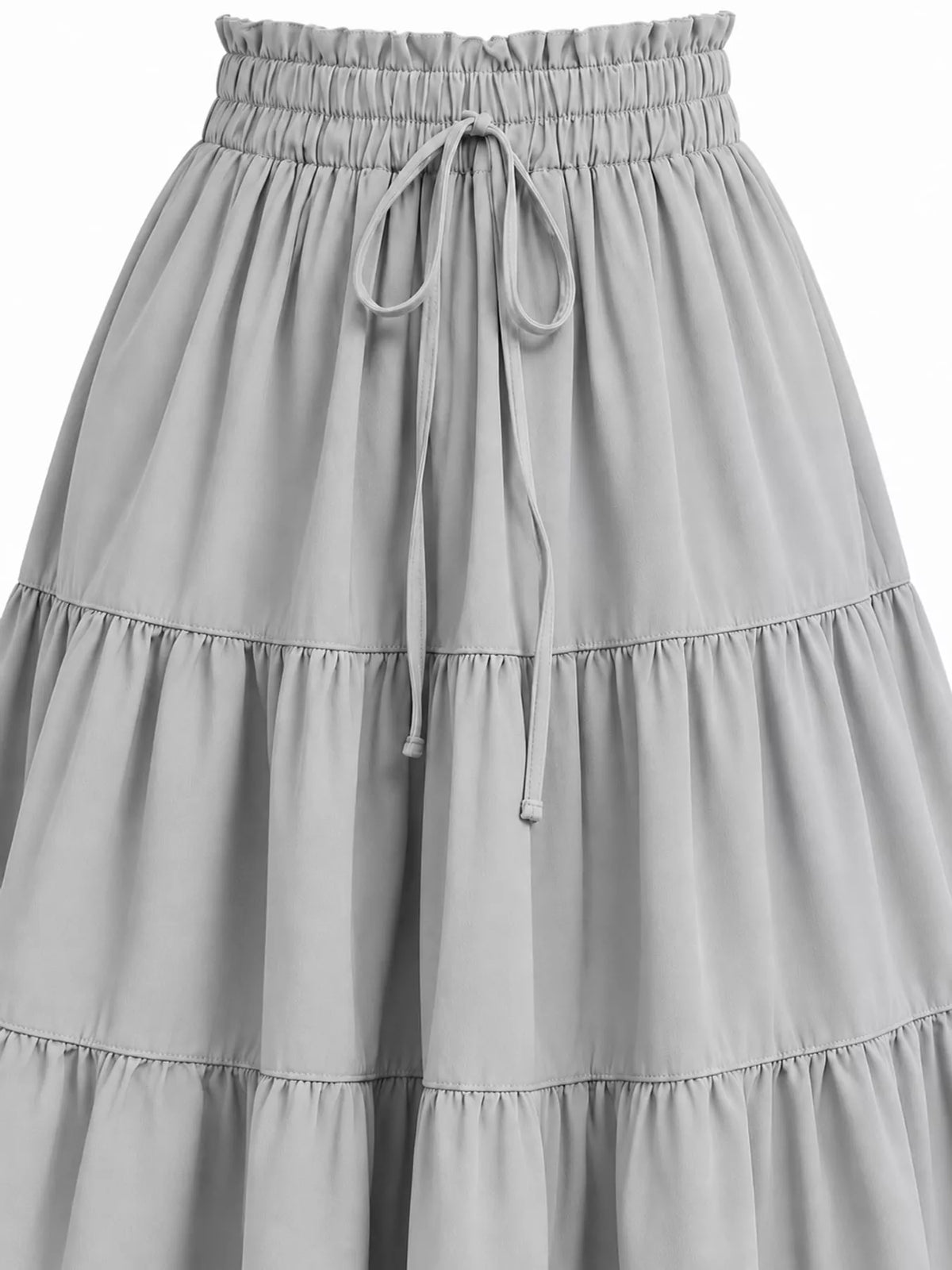 Light gray tiered midi skirt close-up with elastic waist and drawstring tie