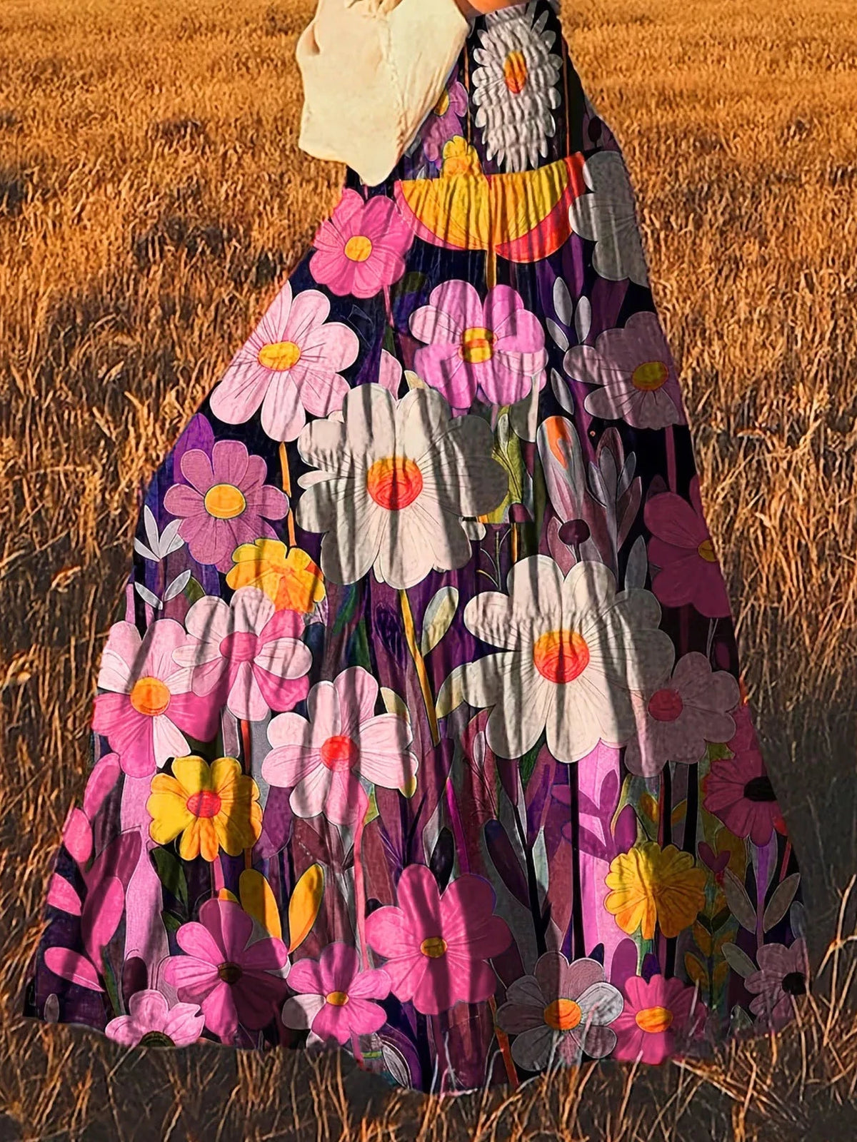 High-waisted maxi skirt with purple and pink floral print and bright tiered ruffles