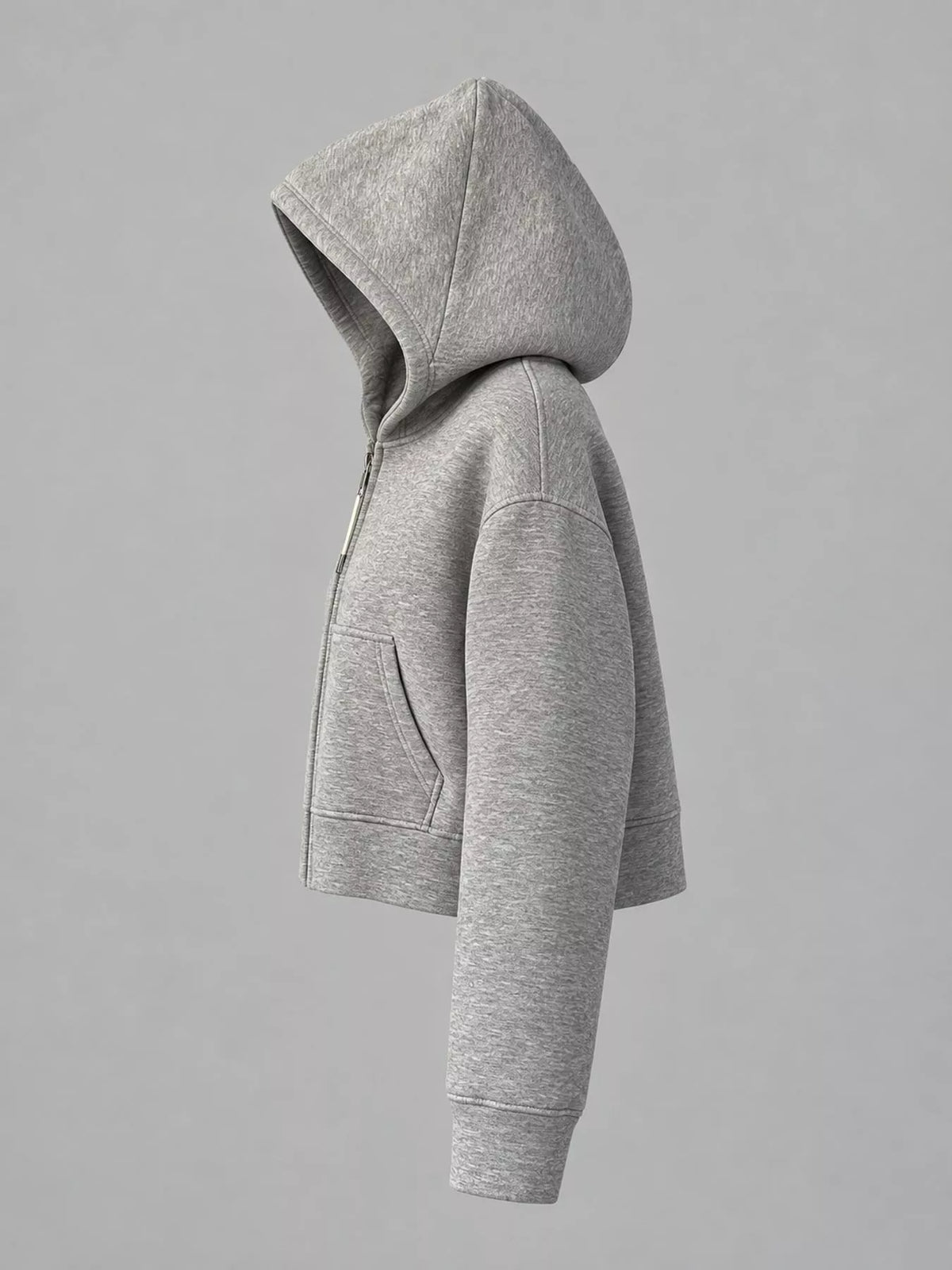 Light gray cropped zip-up hoodie with hood and kangaroo pocket, side view.
