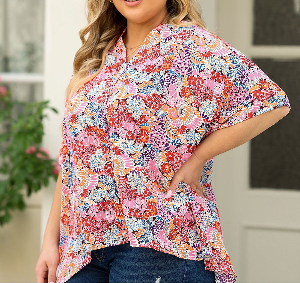 Plus Size Printed Notched Neck Half Sleeve Top